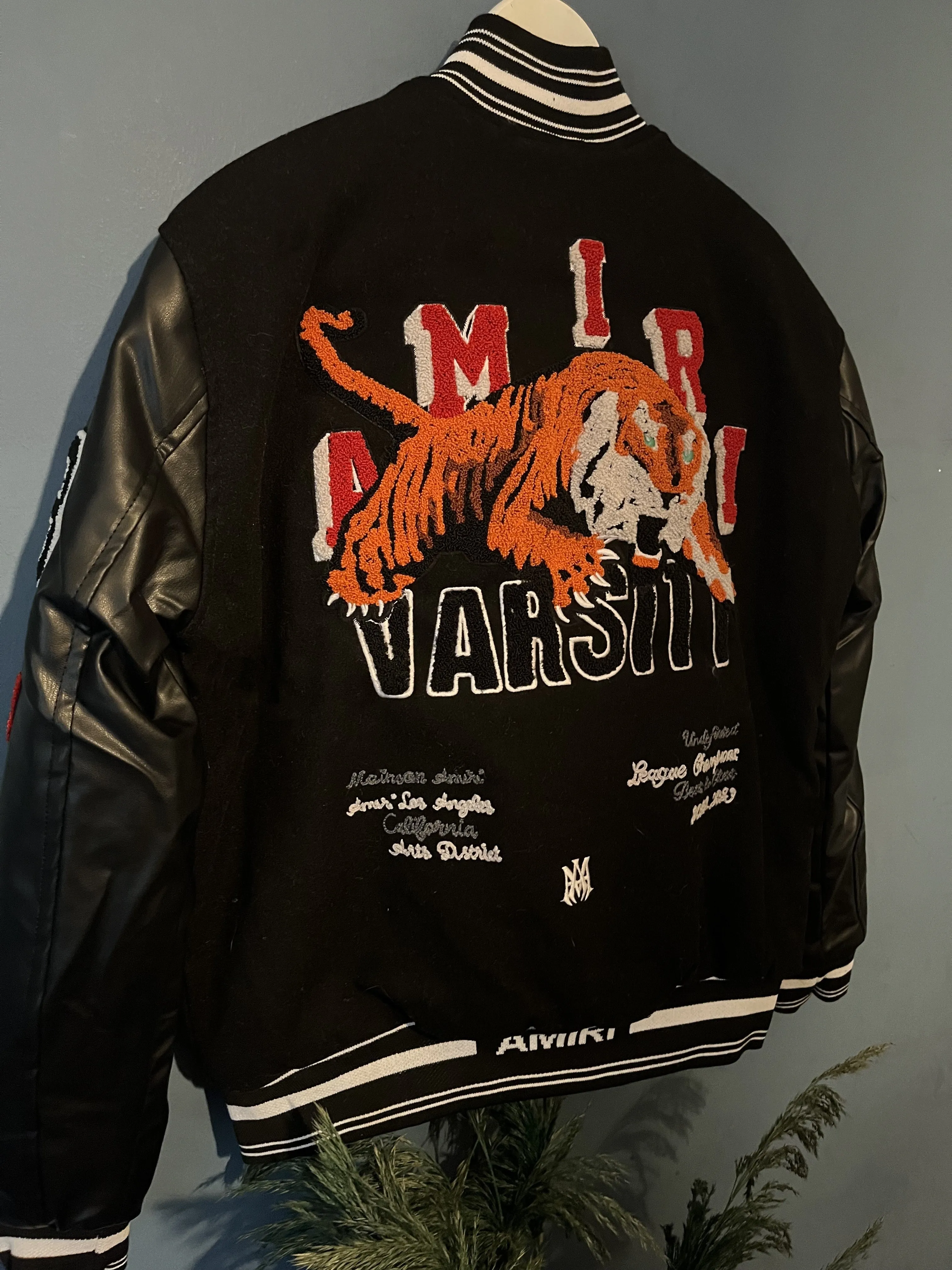 Amiri " Logo-Patch Varsity " Jacket styled in Black for Fall&Winter 2024