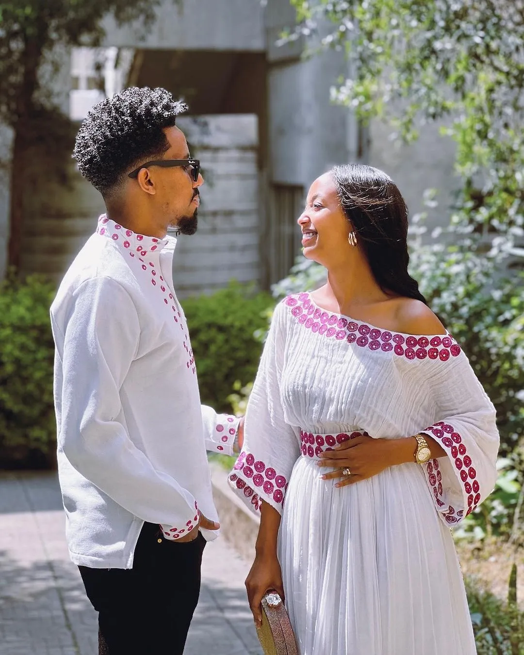 Contemporary Harmony: Beautiful Habesha Couples Outfit with Vibrant Circle Designs