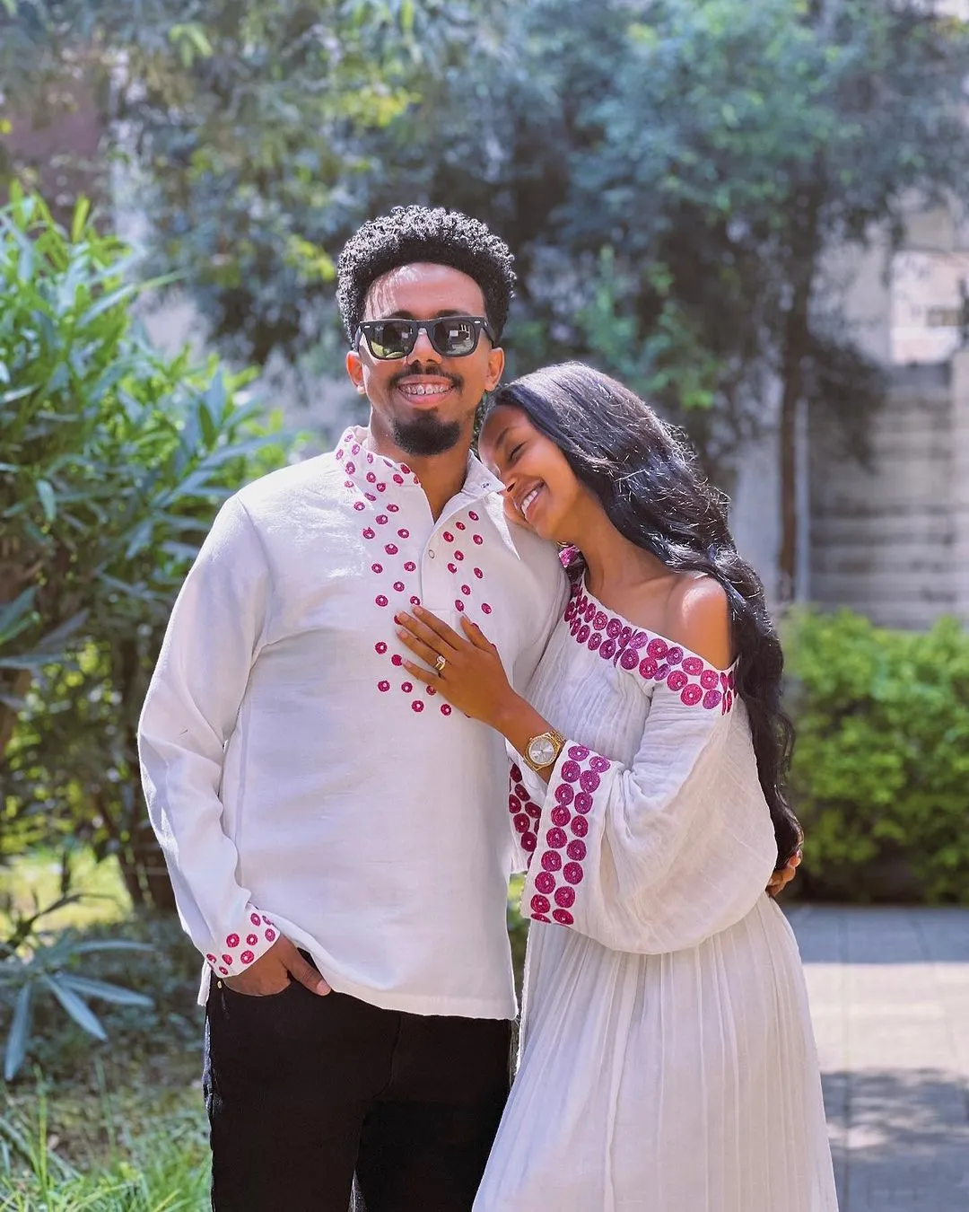 Contemporary Harmony: Beautiful Habesha Couples Outfit with Vibrant Circle Designs