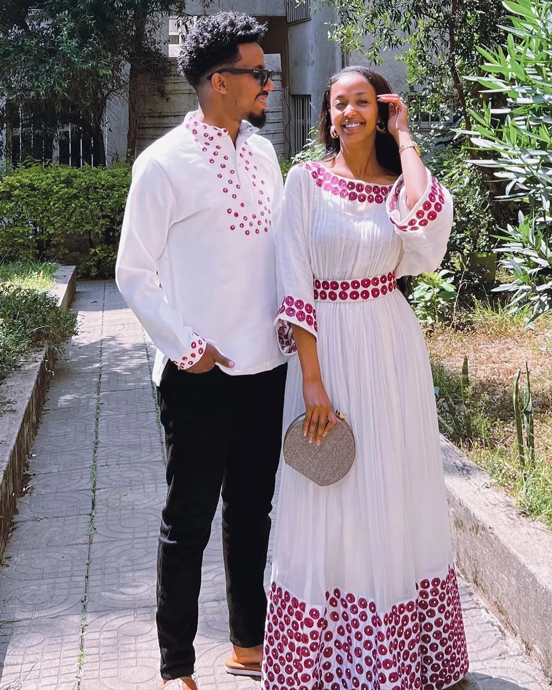 Contemporary Harmony: Beautiful Habesha Couples Outfit with Vibrant Circle Designs