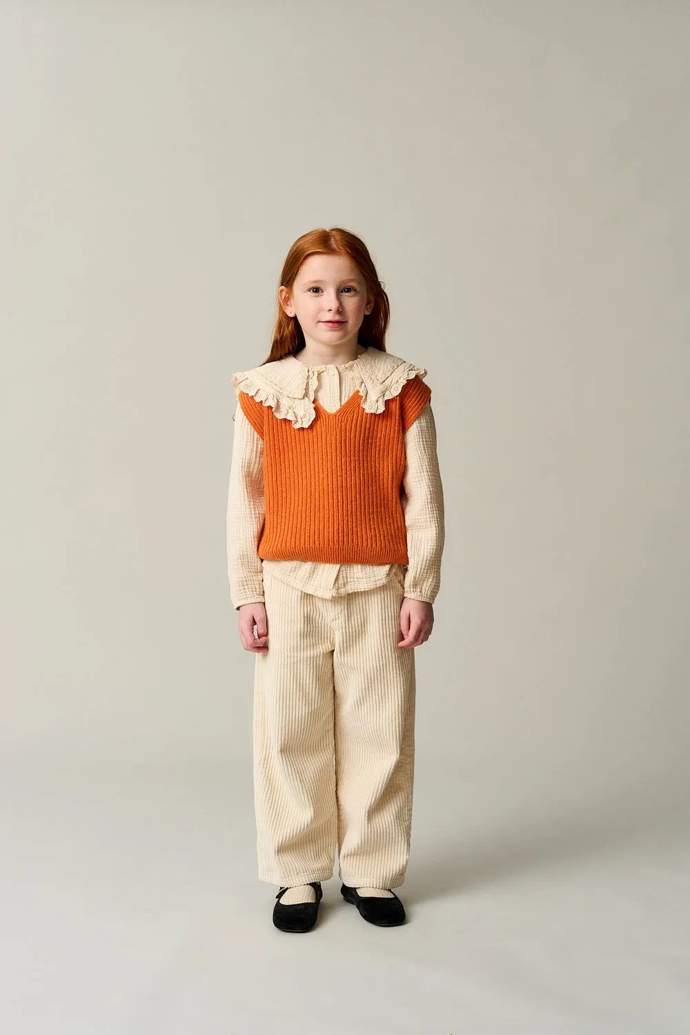 Corduroy pants and collar blouse look